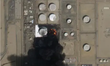  ?? ?? A fire burning at Saudi Aramco's North Jiddah Bulk Plant after an attack by Yemen's Houthi rebels ahead of a Formula One race in Jeddah, Saudi Arabia. Photograph: Planet Labs PBC/AP