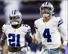  ?? The Associated Press ?? Ezekiel Elliott, left, Dak Prescott have a chance to silence their critics.