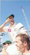  ?? Photo: GETTY IMAGES ?? Big hitter: Michael Hussey is chaired off the pitch by his teammates after the third test against Sri Lanka.