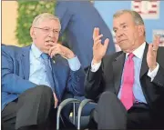  ?? Hans Pennink / The Associated Press ?? National Baseball Hall of Fame inductees Bud Selig (left) and John Schuerholz talk during Sunday’s induction ceremony at the Clark Sports Center in Cooperstow­n, N.Y.