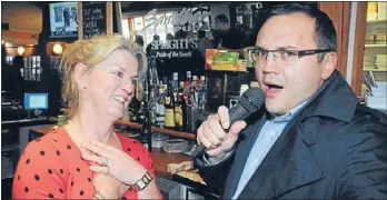  ??  ?? Mayoral croon: The song choice is a secret for now, but Porirua Mayor Nick Leggett is confident he has a tune that will have crowd members, like Lindy Galloway, clapping along.
