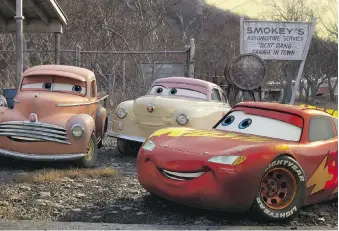  ?? DISNEY PIXAR ?? Veteran racer Lightning McQueen, right, voiced by Owen Wilson, meets a group of characters who represent the roots of car racing in the newest Cars film, which hits theatres on Friday.