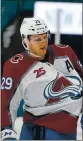  ?? RANDY VAZQUEZ — STAFF ?? Colorado’s Nathan MacKinnon had to leave Wednesday’s game after a hit by Joachim Blichfeld.