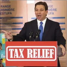  ?? DOUG ENGLE/OCALA STAR-BANNER VIA AP ?? Florida Gov. Ron DeSantis speaks during a news conference at MVP Appliances in Ocala, Fla. Wednesday, Feb. 8, 2023 to announce family-focused tax relief for Florida residents.