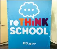  ?? AP PHOTO BY MARIA DANILOVA ?? A poster advertisin­g Education Secretary Betsy Devos's Rethink School initiative is seen at a summit on innovation in higher education held at the Education Department Thursday in Washington.