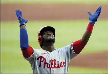  ?? JOHN BAZEMORE — THE ASSOCIATED PRESS ?? The Phillies’ Odubel Herrera reacts as he crosses the plate after hitting a three-run home run in the first inning against the Braves, Friday in Atlanta.