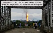  ??  ?? LONG BATTLE: The oil well blaze started after an explosion in June earlier this year