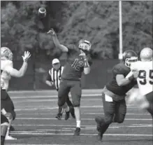  ?? BARRY GRAY, HAMILTON SPECTATOR FILE PHOTO ?? McMaster Marauders quarterbac­k Jackson White airs out a pass against the Ottawa Gee-Gees on Sept. 16.