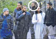  ??  ?? Photo of Usman Khan, circled, used as evidence in his trial