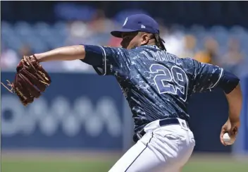  ??  ?? San Diego Padres starting pitcher Dinelson Lamet works against a Colorado Rockies batter during the first inning of a baseball game on Sunday in San Diego. AP PhOTO/OrLAndO rAMIrEz