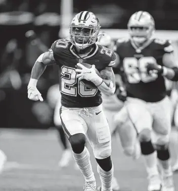  ?? Brett Duke / Associated Press ?? Cowboys running back Tony Pollard scored a 58-yard touchdown against the Saints, but he suffered a plantar fascitis injury on the play that makes him a game-time decision against Washington on Sunday.