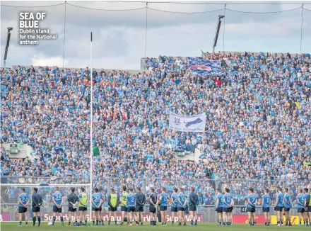  ??  ?? SEA OF BLUE Dublin stand for the National anthem