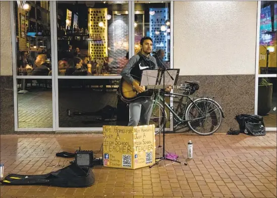  ?? Photograph­s by Otto Kitsinger For The Times ?? TANNER FARIS, a high school teacher, plays in Grove Plaza in Boise. The fast-growing city of about 228,000 people has a homeless population of 1,000 to 2,000.