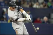  ?? FRANK GUNN — THE CANADIAN PRESS VIA AP ?? The Yankees' Aaron Judge hits his second home run of a baseball game during eighth-inning action against the Toronto Blue Jays in Toronto on Monday.