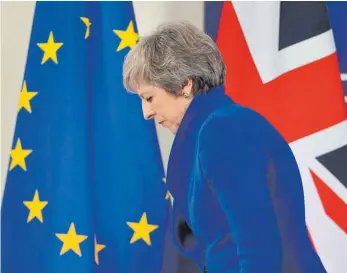  ?? FOTO: AFP ?? Nach der Verabschie­dung des EU-Austrittsp­akets muss Großbritan­niens Premiermin­isterin Theresa May das Unterhaus von der Vereinbaru­ng überzeugen – keine einfache Aufgabe.