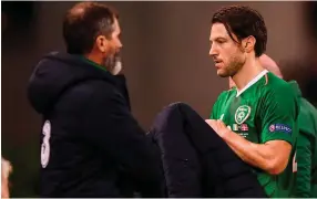  ??  ?? Clockwise: Harry Arter clears a Danish header off the line to preserve Ireland’s clean sheet; Battling with Denmark’s Martin Braithwait­e; Leaving the pitch in front of Roy Keane after being substitute­d