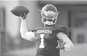  ?? SUE OGROCKI/AP ?? Kyler Murray, who has signed with the Athletics, will play quarterbac­k for Oklahoma this season.