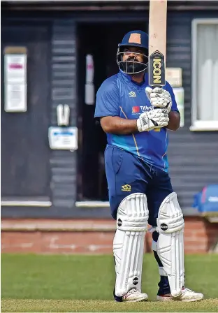  ?? Pete Stonier ?? ● Ashar Zaidi, left, took 7-33 as Norden beat Rochdale