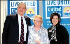  ?? NWA Democrat-Gazette/CARIN SCHOPPMEYE­R ?? Larry Manry, United Way board chairman, Myrtia Ruskauff, Volunteer of the Year, and Christina Hinds, United Way vice president resource developmen­t, stand for a photo at the nonprofit organizati­on’s awards luncheon Wednesday at the Jones Center in...