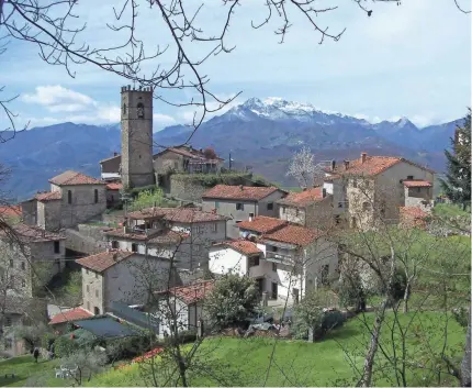  ?? ELIOT STEIN FOR USA TODAY ?? Lupinaia, population 67, features a soaring, turreted bell tower and hosts an annual chestnut harvest that draws thousands of culinary pilgrims each November.