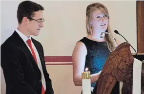  ?? JASON BAIN/EXAMINER ?? Grandchild­ren John and Marie Adams speak during a celebratio­n of life service for former Peterborou­gh MP and MPP Peter Adams at St. John's Anglican Church Saturday.