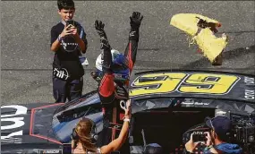  ?? Sean Gardner / Getty Images ?? Daniel Suarez celebrates after winning the NASCAR Cup Series Toyota/Save Mart 350 at Sonoma Raceway on Sunday in Sonoma, Calif.