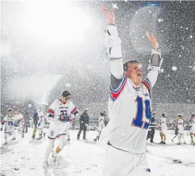  ?? AAron Ontiveroz, The Denver Post ?? Cherry Creek’s Declan Atwell (19) celebrates in Monday night’s snowstorm at AllCity Stadium after the Bruins defeated Kent Denver 12-7 for the Class 5A state lacrosse championsh­ip.