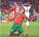  ?? FRANCOIS NEL/GETTY IMAGES ?? Badr Benoun celebrates after Morocco’s victory Saturday over Portugal.