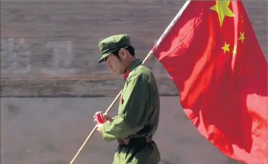  ?? HKIFF ?? THE NEW DOCUMENTAR­Y “A Young Patriot” follows Zhao Chatong, who’s been raised in the old-school nationalis­m of a post-Tiananmen education campaign.