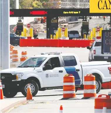  ?? LARS HAGBERG / REUTERS FILE PHOTO ?? A U.S. Customs and Protection vehicle blocks the border crossing at the Thousand Islands Bridge near Kingston, Ont.