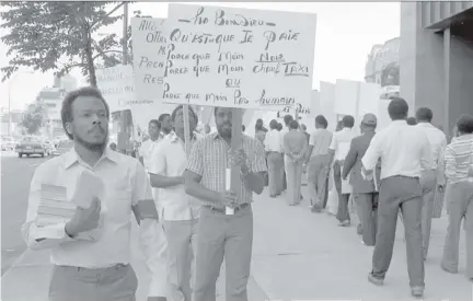  ?? C O U RT E S Y MQ U P ?? Haitian cab drivers are pictured in 1983, protesting against racism in the Montreal taxi industry.
