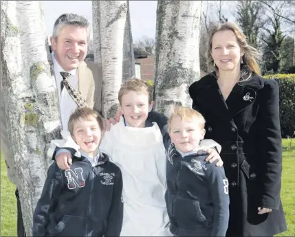  ??  ?? Liam Blackbyrne enjoying his Confirmati­on day at St Anne’s Shankill with Warren, Jamie, Conor and Orla Blackbyrne.