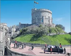  ??  ?? The funeral procession leaves Windsor Castle