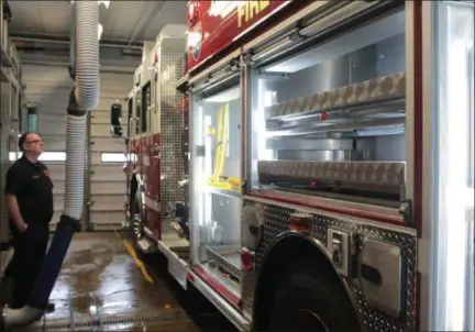  ?? KRISTI GARABRANDT— THE NEWS-HERALD ?? Concord Fire Chief Matt Sabo looks over the new rescue pumper delivered the to the station on Jan. 29. Sabo expects up-fitting the truck will take a couple of months and it hopes it will be ready to be put into service by mid-April.