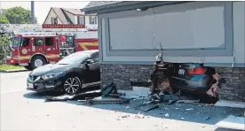  ?? HARRY ROSETTANI SPECIAL TO TORSTAR ?? A vehicle crashed into a building on Drummond Road in Niagara Falls after allegedly failing to stop for police going back to Burlington Thursday.