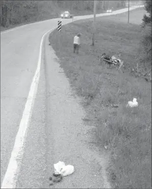  ??  ?? Scene: A photo provided by Arkansas State Police shows wreckage of a motorcycle belonging to Bobby Petrino, who later disclosed he was riding with a female employee when the April 1 crash occurred.