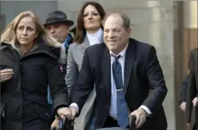  ?? Mary Altaffer/Associated Press ?? Harvey Weinstein leaves the courthouse in New York on Friday during jury deliberati­ons in his rape trial.