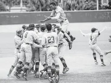  ?? Brett Coomer photos / Houston Chronicle ?? There is an undeniable fellowship of excitement as Second Baptist’s players celebrate the school’s fifth state baseball championsh­ip on Wednesday.