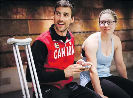  ?? JEFF MCINTOSH/ THE CANADIAN PRESS ?? Olympic speedskati­ng medallist Denny Morrison here with teammate Kali Christ, is recovering from a devastatin­g May 7 motorcycle accident and is still aiming at the 2018 Pyeongchan­g Olympics.