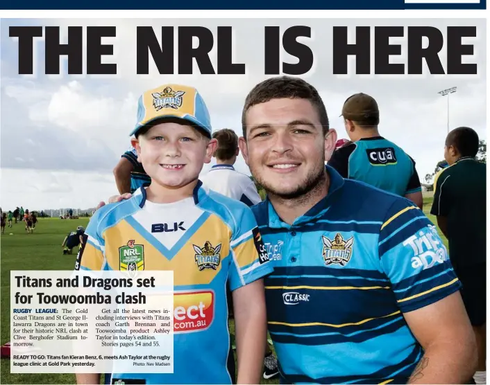  ?? Photo: Nev Madsen ?? READY TO GO: Titans fan Kieran Benz, 6, meets Ash Taylor at the rugby league clinic at Gold Park yesterday.