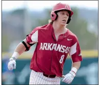  ?? NWA Democrat-Gazette/ANDY SHUPE ?? Arkansas outfielder Eric Cole said the Razorbacks are leery of Alabama for this weekend’s series, even though the Tide have lost six SEC games in a row. “It’s a crazy conference,” he said.