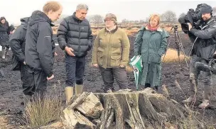  ??  ?? Chris Miller, Mick Weston and Anne Selby of the Lancashire Wildlife Trust with environmen­t minister Therese Coffey (centre)