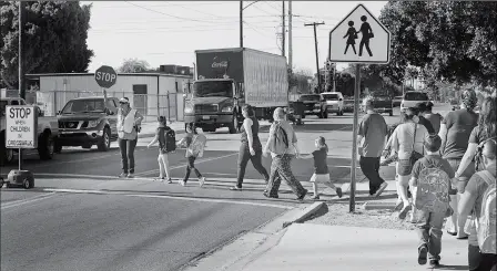  ?? Buy this photo at YumaSun.com FILE PHOTO BY RANDY HOEFT/YUMA SUN ?? “BY EXERCISING A LITTLE EXTRA CARE AND CAUTION, DRIVERS AND PEDESTRIAN­S can co-exist safely in school zones,” Yuma County Sheriff Leon Wilmot wrote in a recent statement.