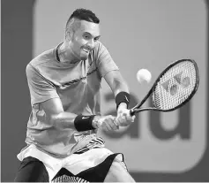  ??  ?? Nick Kyrgios of Australia in action against Roger Federer of Switzerlan­d in the semi finals at Crandon Park Tennis Center on March 31 file photo in Key Biscayne, Florida. — AFP photo