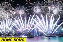  ??  ?? GREAT THRALL OF CHINA Pyrotechni­cs over Hong Kong harbour HONG KONG