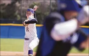  ?? Dave Stewart / Hearst Connecticu­t Media ?? Westhill’s Kyle Kipp fires in a pitch against Hall at Cubeta Stadium in Stamford on Saturday.