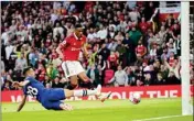  ?? AP/PTI ?? Cesar Azpilicuet­a (left) in action as Anthony Martial scores a goal during the English Premier League
