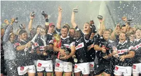  ?? Picture: GALLO IMAGES ?? ONE MORE TIME? The Sharks celebrate their win in Cape Town last year