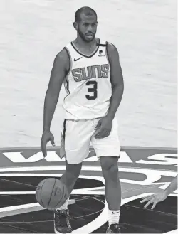  ?? GEOFF BURKE/USA TODAY SPORTS ?? Phoenix Suns guard Chris Paul (3) dribbles the ball against the Washington Wizards at Capital One Arena last week.