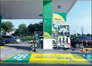  ?? PROVIDED TO CHINA DAILY ?? A sedan receives gasolene at a gas station of BP-PetroChina Petroleum Company Ltd, a joint venture between BP and PetroChina, in Shunde, Guangdong province. The JV began operations in 2001 and now operates more than 440 outlets across the Pearl River Delta region in South China.